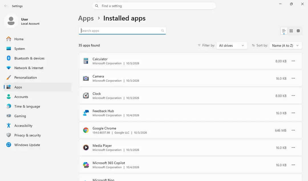 Windows 11 Settings, Apps, Installed apps page listing installed programs with a search box and sort options