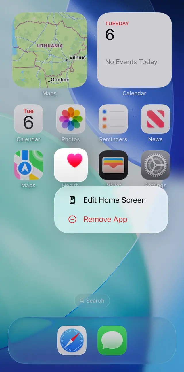 iPhone home screen with the Remove App option shown after touching and holding an app icon