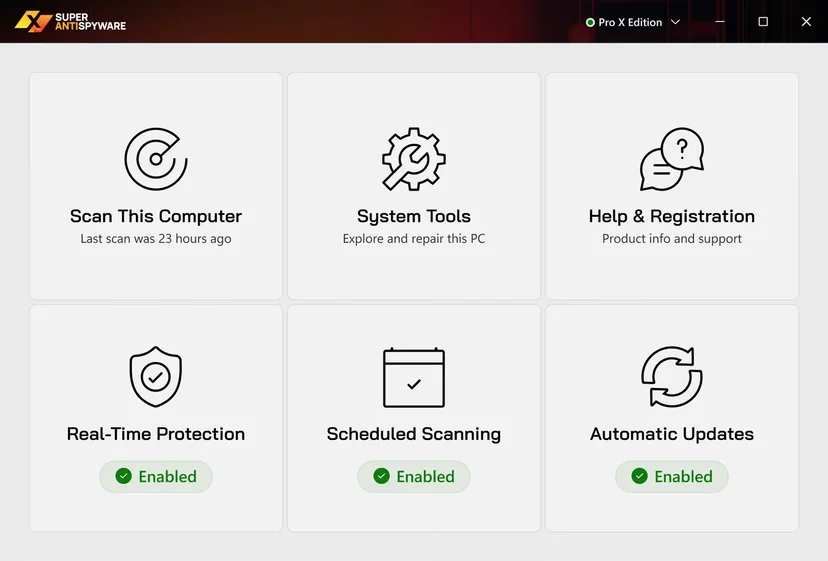 SUPERAntiSpyware Professional X Edition main window with scan, system tools, real-time protection, scheduled scanning and automatic updates tiles